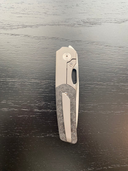 Sweeney (Marble Carbon Fiber)